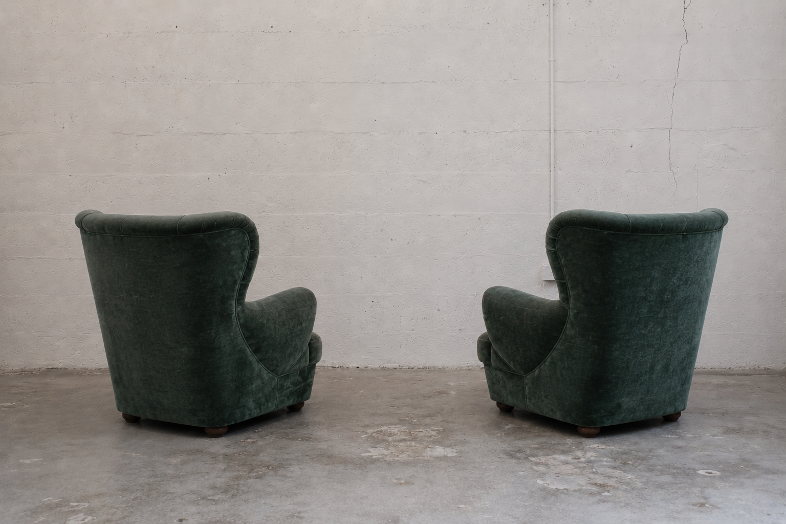 PAIR OF TUFTED WINGBACK LOUNGE CHAIRS