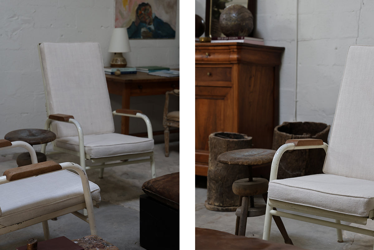 PAIR OF JEAN PROUVE & JULES LELEU “MARTEL DE JANVILLE” ADJUSTABLE ARMCHAIRS