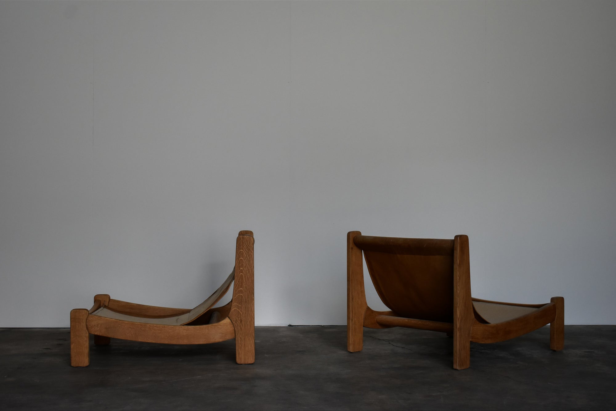 PAIR OF LEATHER SLING CHAIRS